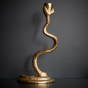 Gold snake-shaped candle holder